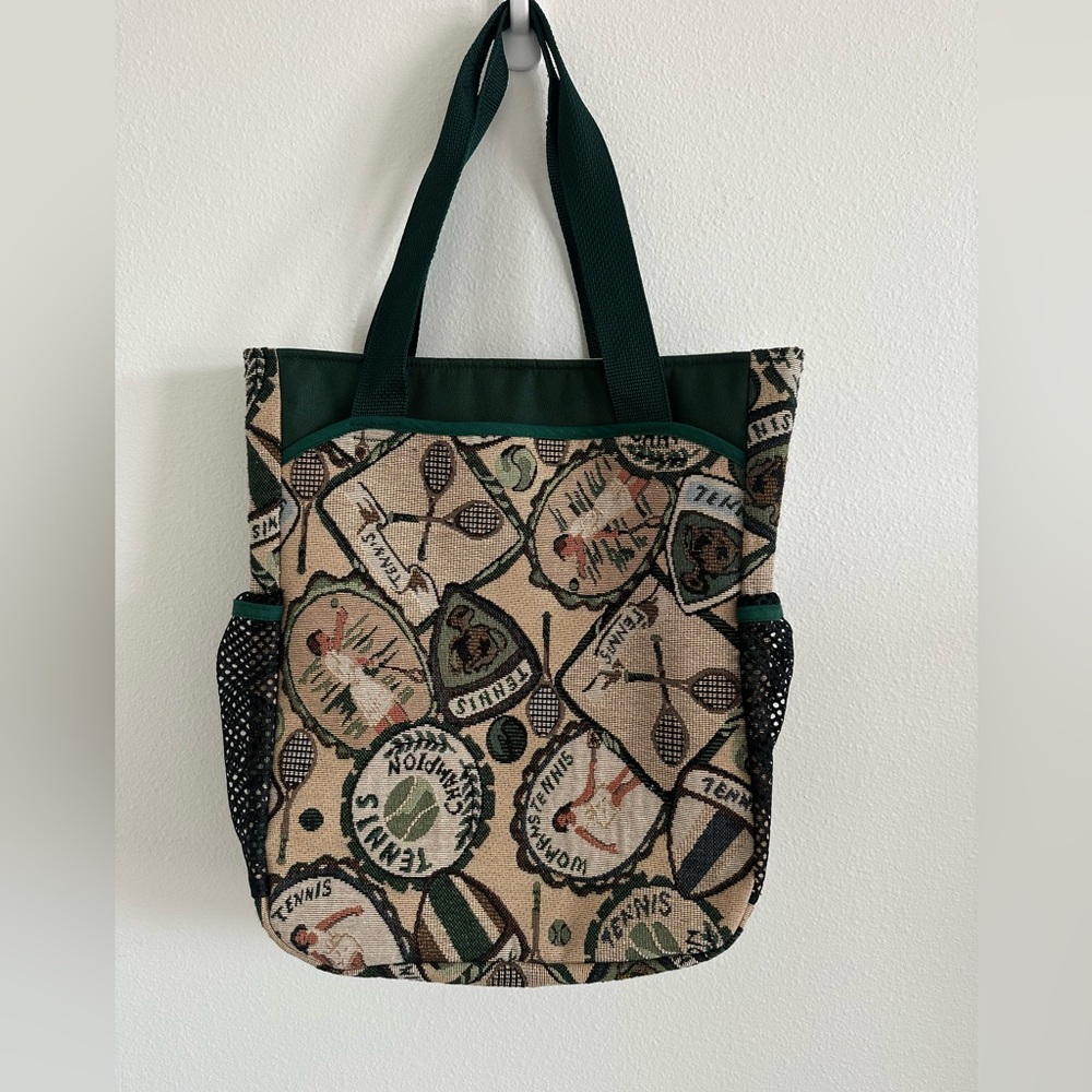 Tennis tapestry tote bag. Great condition. 2 end mesh pockets for water bottles.